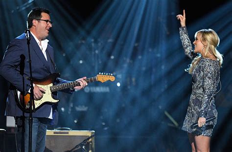 carrie underwood and vince gill singing how great thou art: The Melodic Intersection of Faith and Artistry